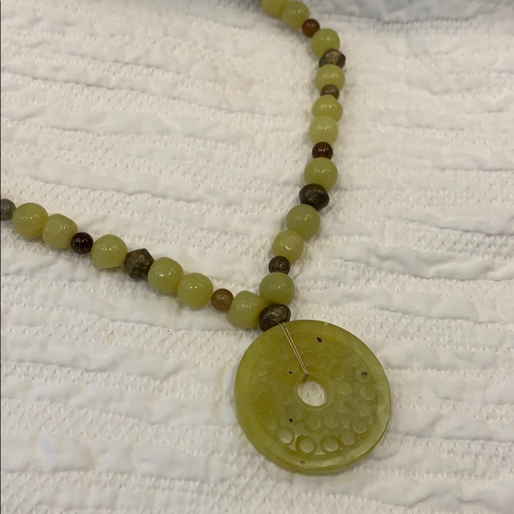 Natural stones with antique brass accents